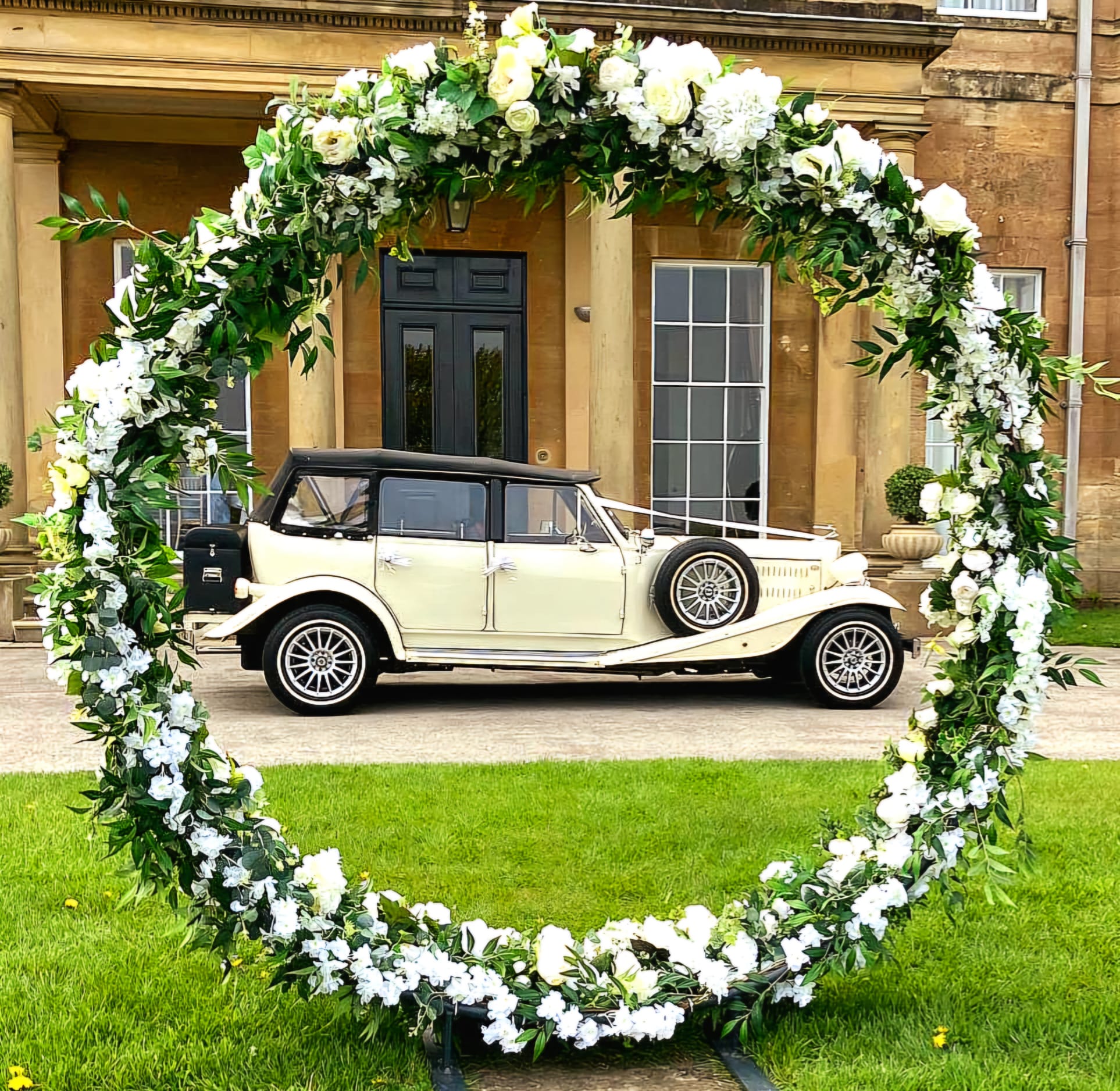 Eva-Mia in floral wedding arch